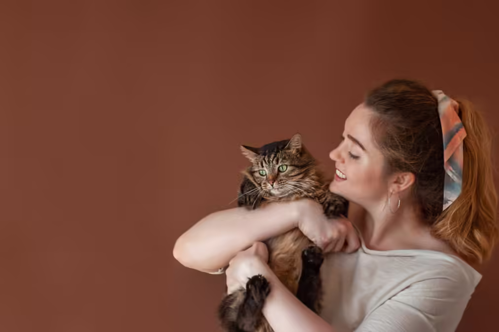 woman holding a cat