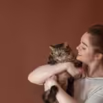 woman holding a cat